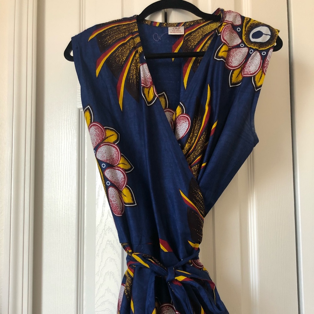 Dazzling blue ethnic print wrap dress